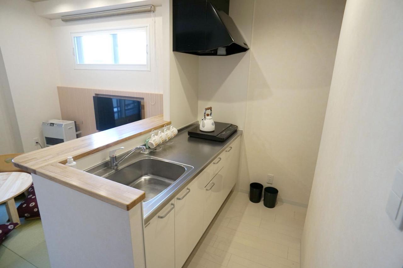 Momo Premium 403 Apartment Sapporo Bagian luar foto