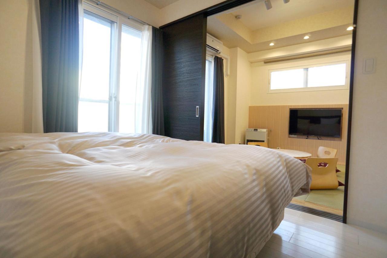 Momo Premium 403 Apartment Sapporo Bagian luar foto